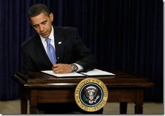 obama-signing-alone.preview