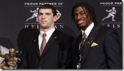 Dec 10, 2011; New York, NY, USA; Heisman Trophy finalists from left Trent Richardson , Montee Ball , Tyrann Mathieu , Andrew Luck , and Robert Griffin III pose for a photo with the Heisman Trophy during a press conference before the announcement of the 2011 Heisman Trophy winner at the Marriott Marquis in downtown New York City.  Mandatory Credit: Jerry Lai-US PRESSWIRE