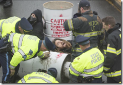 Boston-Protester-Block-Route-93-on-ground-620x429