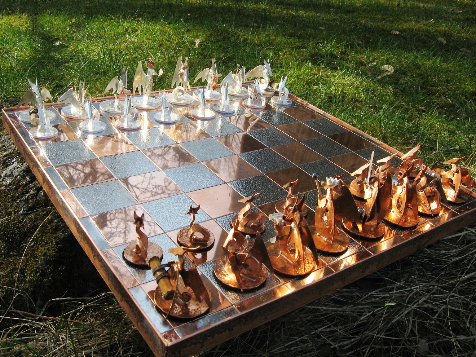 chess_set_of_dragons_by_obiskus_d1e6ymu.jpg