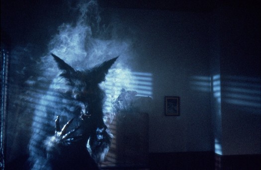 A werewolf with smoke rising off his body.