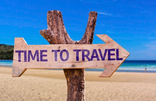 time-to-travel-wooden-sign-beach-background-49509295(1).jpg