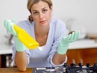 woman-cleaning-stove.jpg